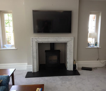 Charnwood Cove 2 Stove - with low stand in black fitted by our installers in Guildford, Surrey.